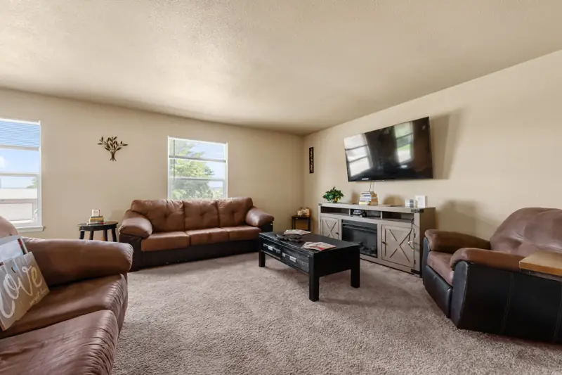Furnished living room at a CM Property Group home